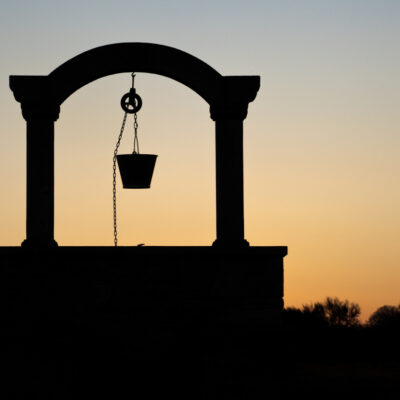 silhouette of a well